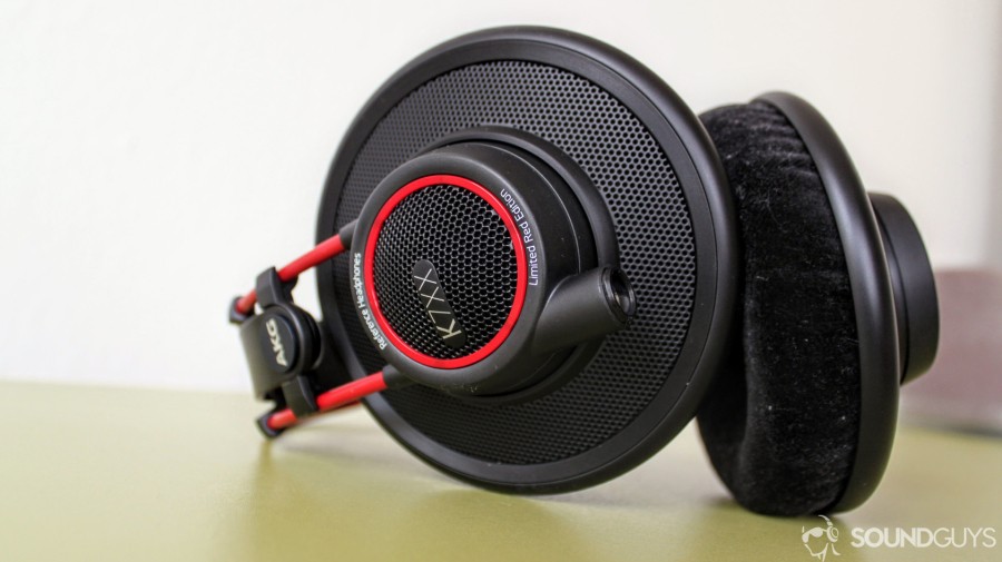 A close-up photo of the AKG K7XX's on its side revealing the cable input. 