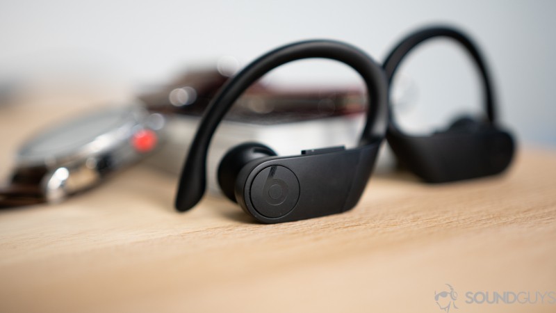 A close-up photo of the playback control buttons on the Beats Powerbeats Pro.