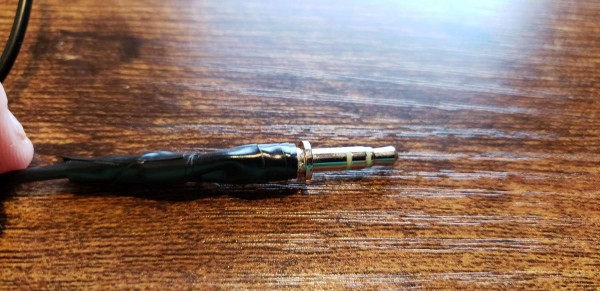 how to fix headphone jack - plug wrapped with tape and done